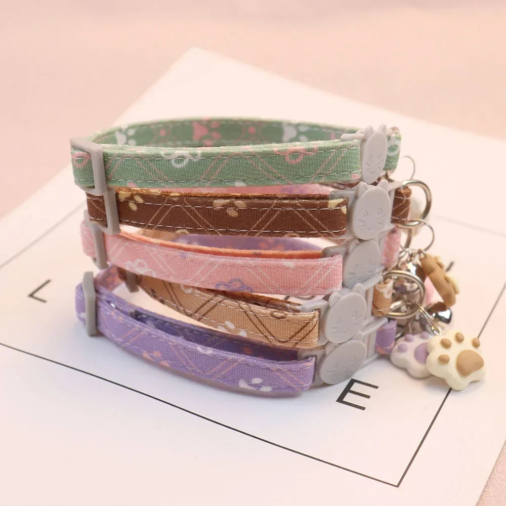 Adjustable Pet Collar with Bell – Paw Print Design for Small Dogs & Cats