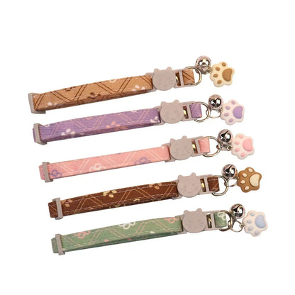 Adjustable Pet Collar with Bell – Paw Print Design for Small Dogs & Cats
